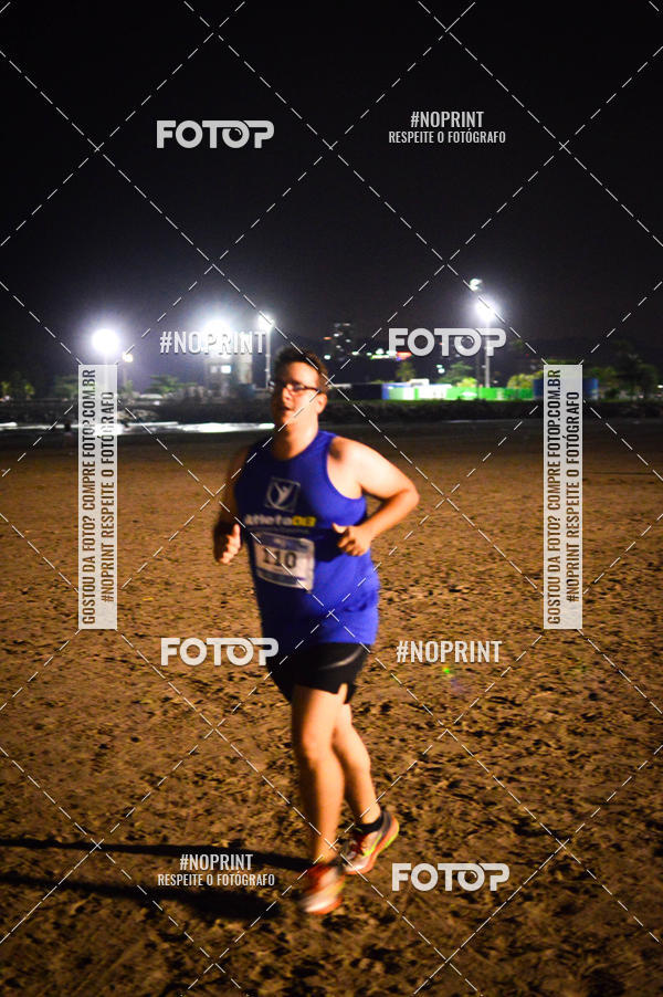 Buy your photos of the eventJovem Pan Night Run Santos on Fotop