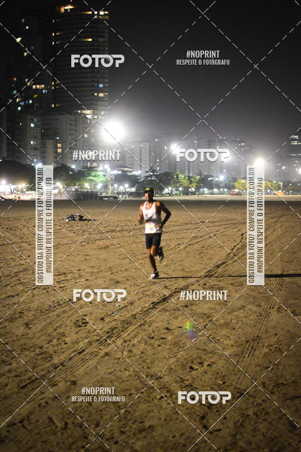 Buy your photos of the eventJovem Pan Night Run Santos on Fotop