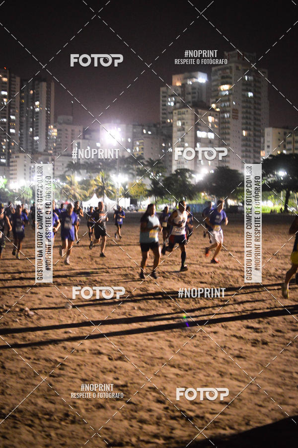 Buy your photos of the eventJovem Pan Night Run Santos on Fotop