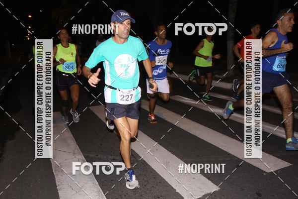 Buy your photos of the eventNight Run 5K 10K Praia Grande on Fotop