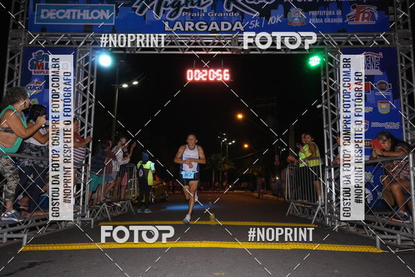 Buy your photos of the eventNight Run 5K 10K Praia Grande on Fotop