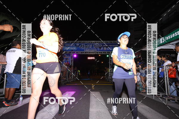 Buy your photos of the eventNight Run 5K 10K Praia Grande on Fotop