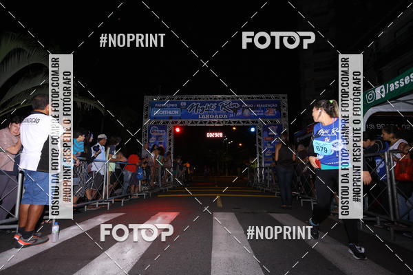 Buy your photos of the eventNight Run 5K 10K Praia Grande on Fotop