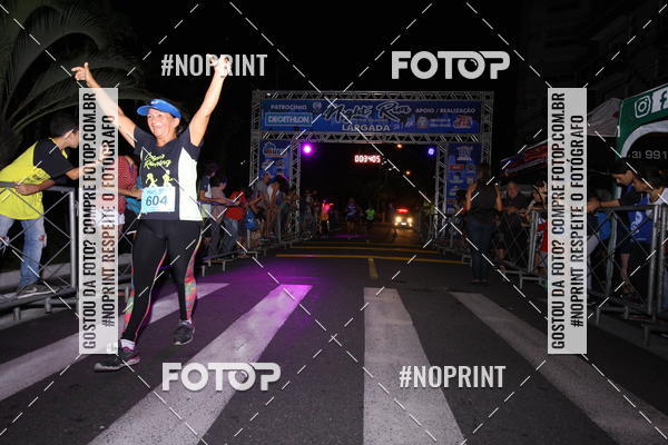 Buy your photos of the eventNight Run 5K 10K Praia Grande on Fotop