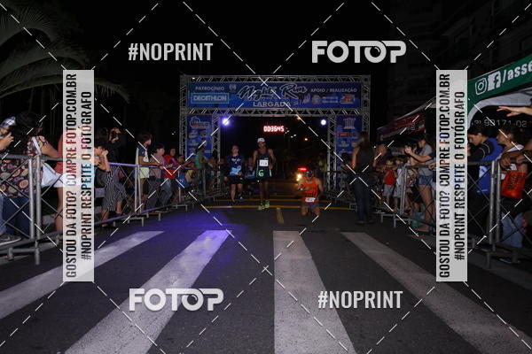 Buy your photos of the eventNight Run 5K 10K Praia Grande on Fotop