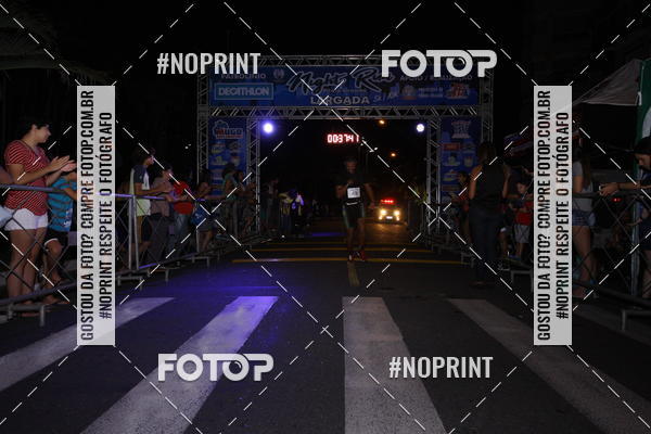 Buy your photos of the eventNight Run 5K 10K Praia Grande on Fotop