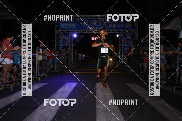 Buy your photos of the eventNight Run 5K 10K Praia Grande on Fotop
