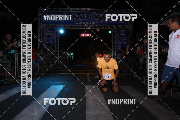 Buy your photos of the eventNight Run 5K 10K Praia Grande on Fotop