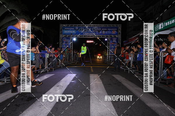 Buy your photos of the eventNight Run 5K 10K Praia Grande on Fotop