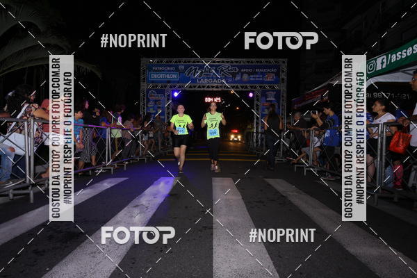 Buy your photos of the eventNight Run 5K 10K Praia Grande on Fotop