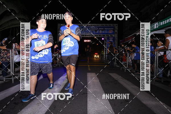 Buy your photos of the eventNight Run 5K 10K Praia Grande on Fotop