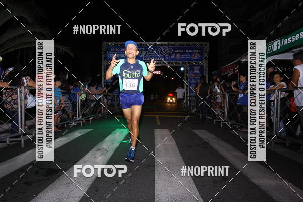 Buy your photos of the eventNight Run 5K 10K Praia Grande on Fotop