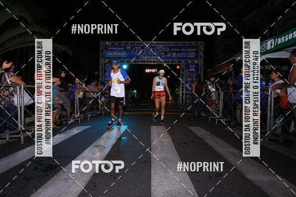 Buy your photos of the eventNight Run 5K 10K Praia Grande on Fotop