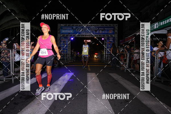 Buy your photos of the eventNight Run 5K 10K Praia Grande on Fotop