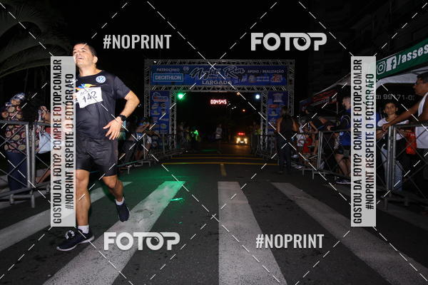 Buy your photos of the eventNight Run 5K 10K Praia Grande on Fotop