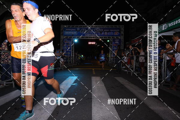 Buy your photos of the eventNight Run 5K 10K Praia Grande on Fotop