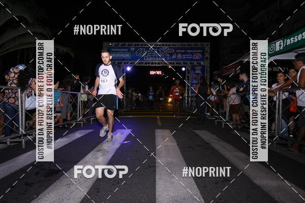 Buy your photos of the eventNight Run 5K 10K Praia Grande on Fotop
