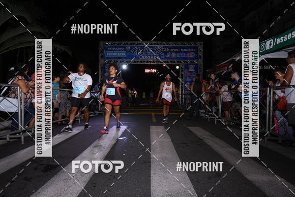 Buy your photos of the eventNight Run 5K 10K Praia Grande on Fotop