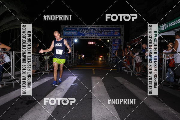Buy your photos of the eventNight Run 5K 10K Praia Grande on Fotop