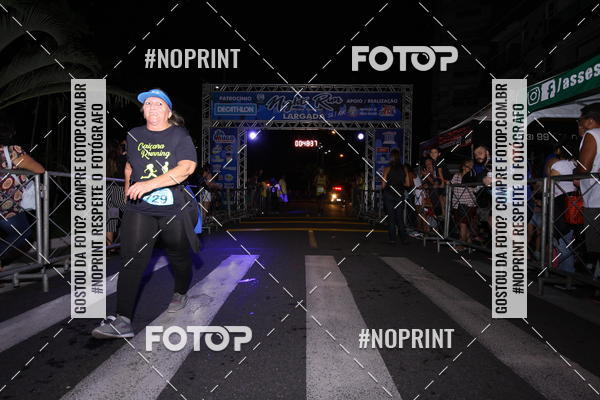 Buy your photos of the eventNight Run 5K 10K Praia Grande on Fotop