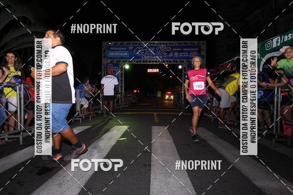 Buy your photos of the eventNight Run 5K 10K Praia Grande on Fotop