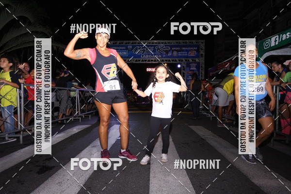 Buy your photos of the eventNight Run 5K 10K Praia Grande on Fotop