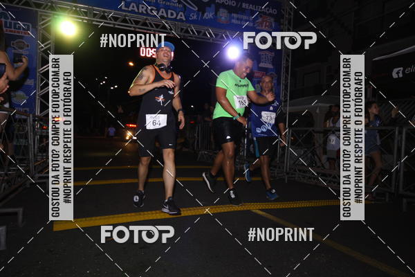 Buy your photos of the eventNight Run 5K 10K Praia Grande on Fotop