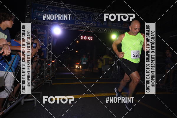 Buy your photos of the eventNight Run 5K 10K Praia Grande on Fotop