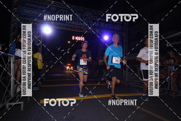 Buy your photos of the eventNight Run 5K 10K Praia Grande on Fotop