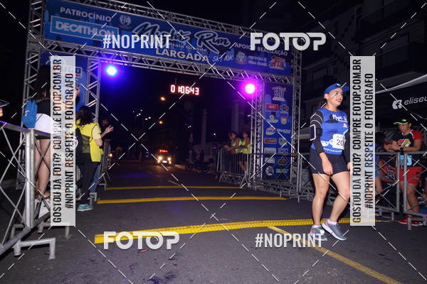 Buy your photos of the eventNight Run 5K 10K Praia Grande on Fotop