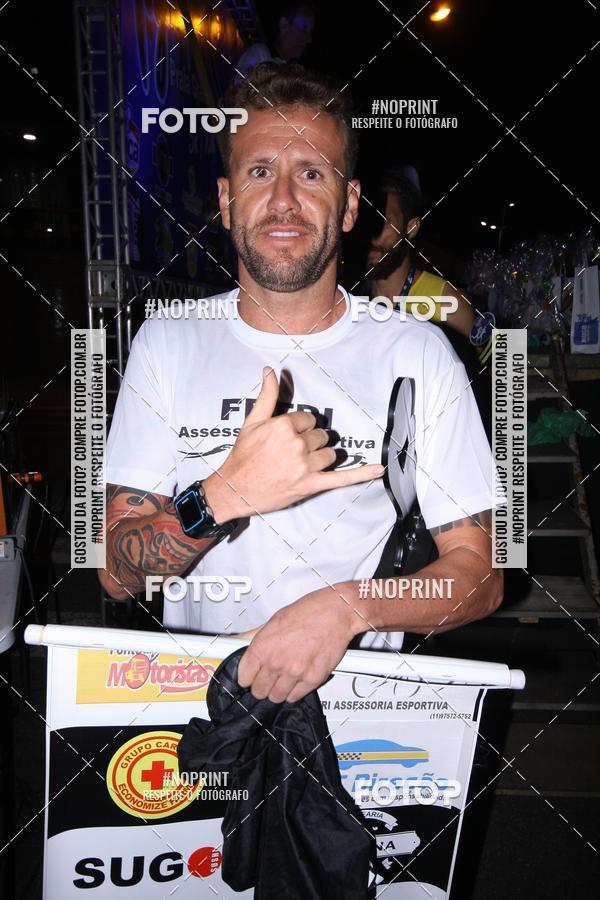 Buy your photos of the eventNight Run 5K 10K Praia Grande on Fotop