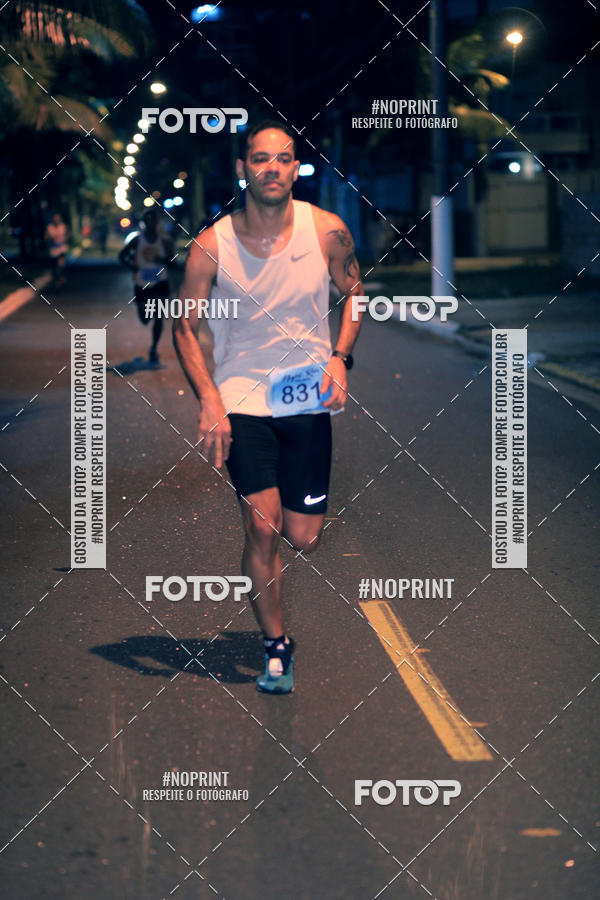 Buy your photos of the eventNight Run 5K 10K Praia Grande on Fotop