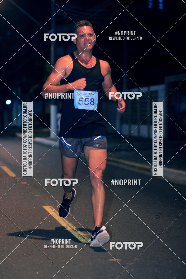 Buy your photos of the eventNight Run 5K 10K Praia Grande on Fotop