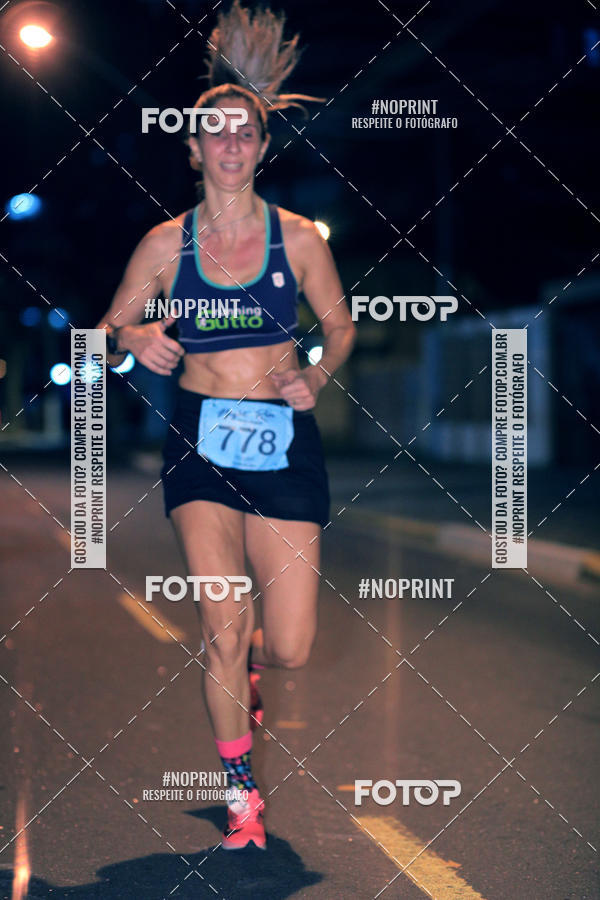 Buy your photos of the eventNight Run 5K 10K Praia Grande on Fotop