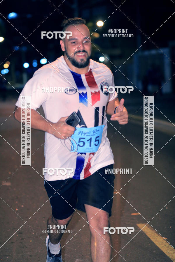 Buy your photos of the eventNight Run 5K 10K Praia Grande on Fotop