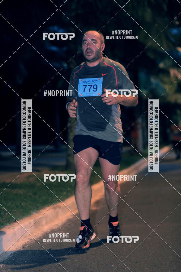 Buy your photos of the eventNight Run 5K 10K Praia Grande on Fotop