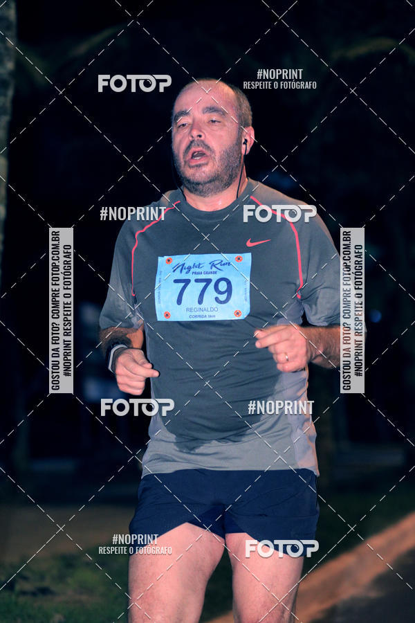 Buy your photos of the eventNight Run 5K 10K Praia Grande on Fotop