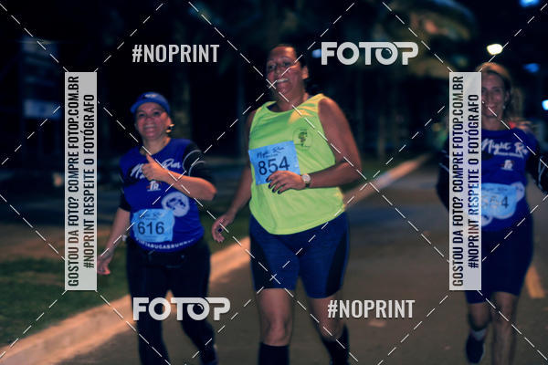 Buy your photos of the eventNight Run 5K 10K Praia Grande on Fotop