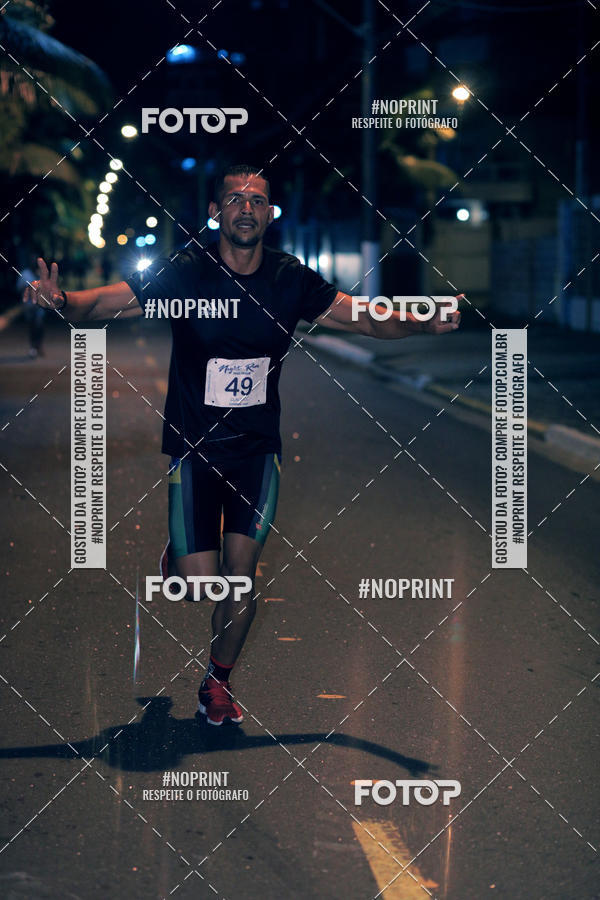 Buy your photos of the eventNight Run 5K 10K Praia Grande on Fotop