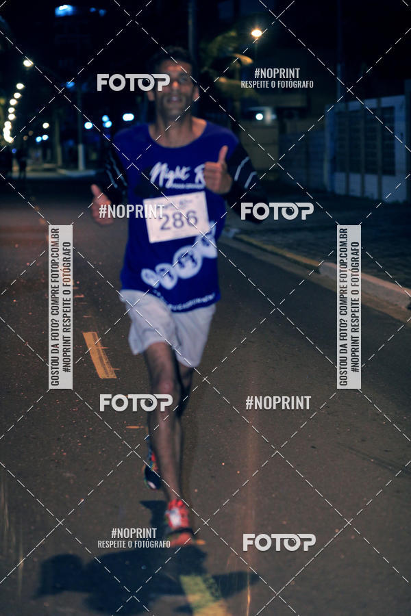 Buy your photos of the eventNight Run 5K 10K Praia Grande on Fotop