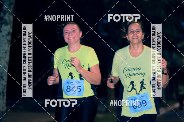 Buy your photos of the eventNight Run 5K 10K Praia Grande on Fotop
