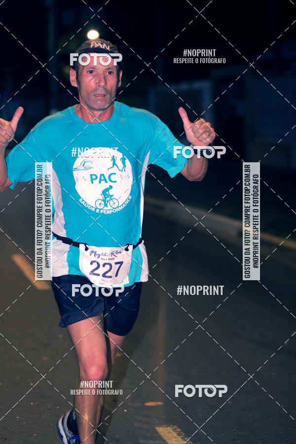 Buy your photos of the eventNight Run 5K 10K Praia Grande on Fotop