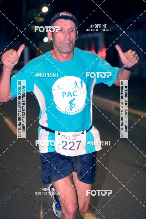 Buy your photos of the eventNight Run 5K 10K Praia Grande on Fotop