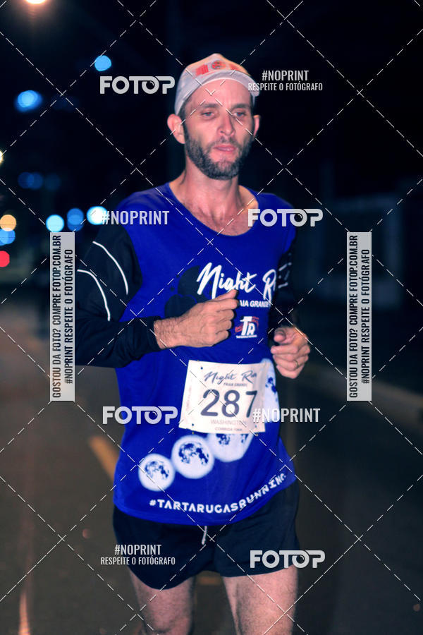 Buy your photos of the eventNight Run 5K 10K Praia Grande on Fotop