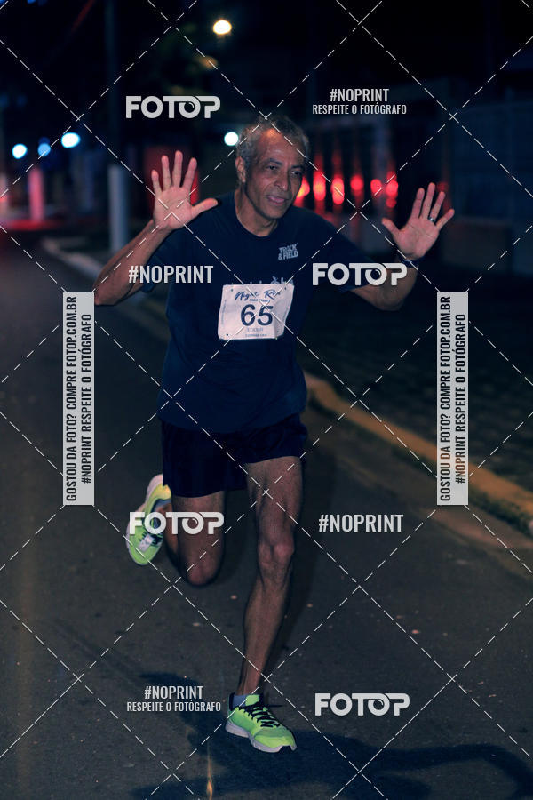 Buy your photos of the eventNight Run 5K 10K Praia Grande on Fotop