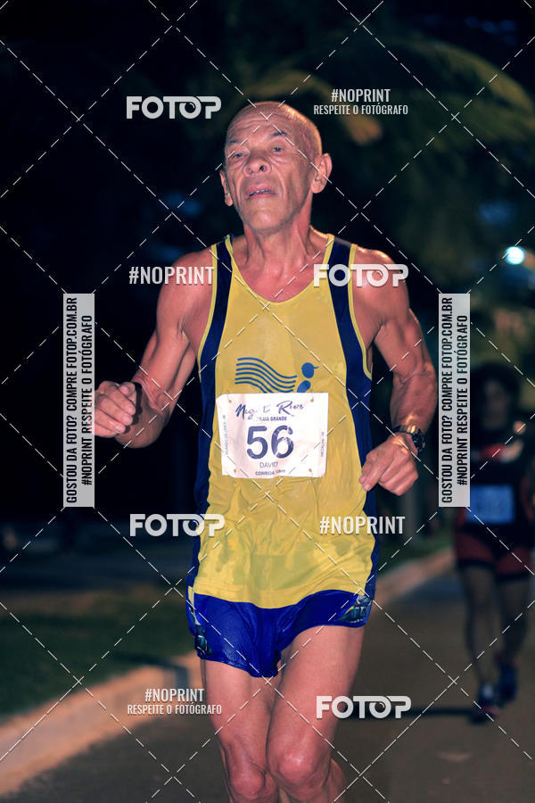 Buy your photos of the eventNight Run 5K 10K Praia Grande on Fotop