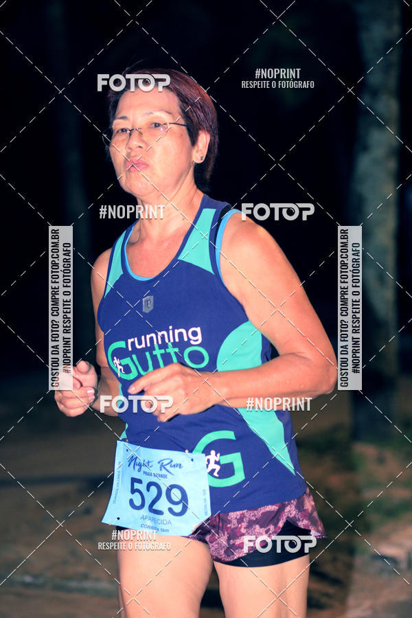 Buy your photos of the eventNight Run 5K 10K Praia Grande on Fotop