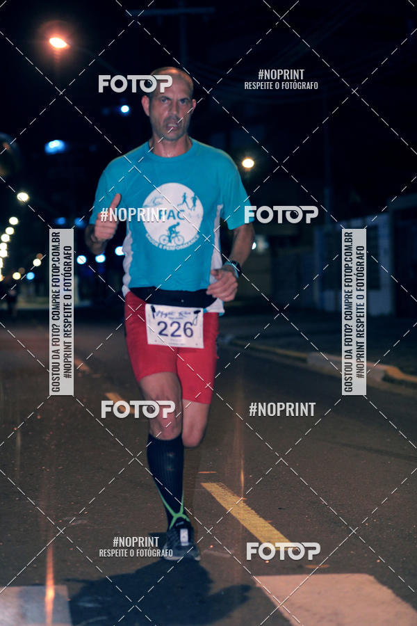 Buy your photos of the eventNight Run 5K 10K Praia Grande on Fotop