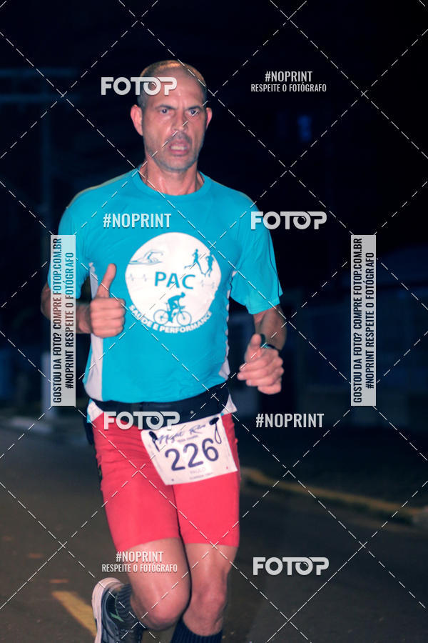 Buy your photos of the eventNight Run 5K 10K Praia Grande on Fotop