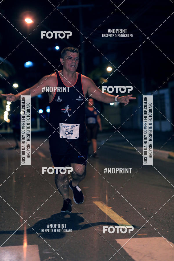 Buy your photos of the eventNight Run 5K 10K Praia Grande on Fotop